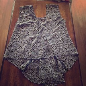Sheer patterned tank top.